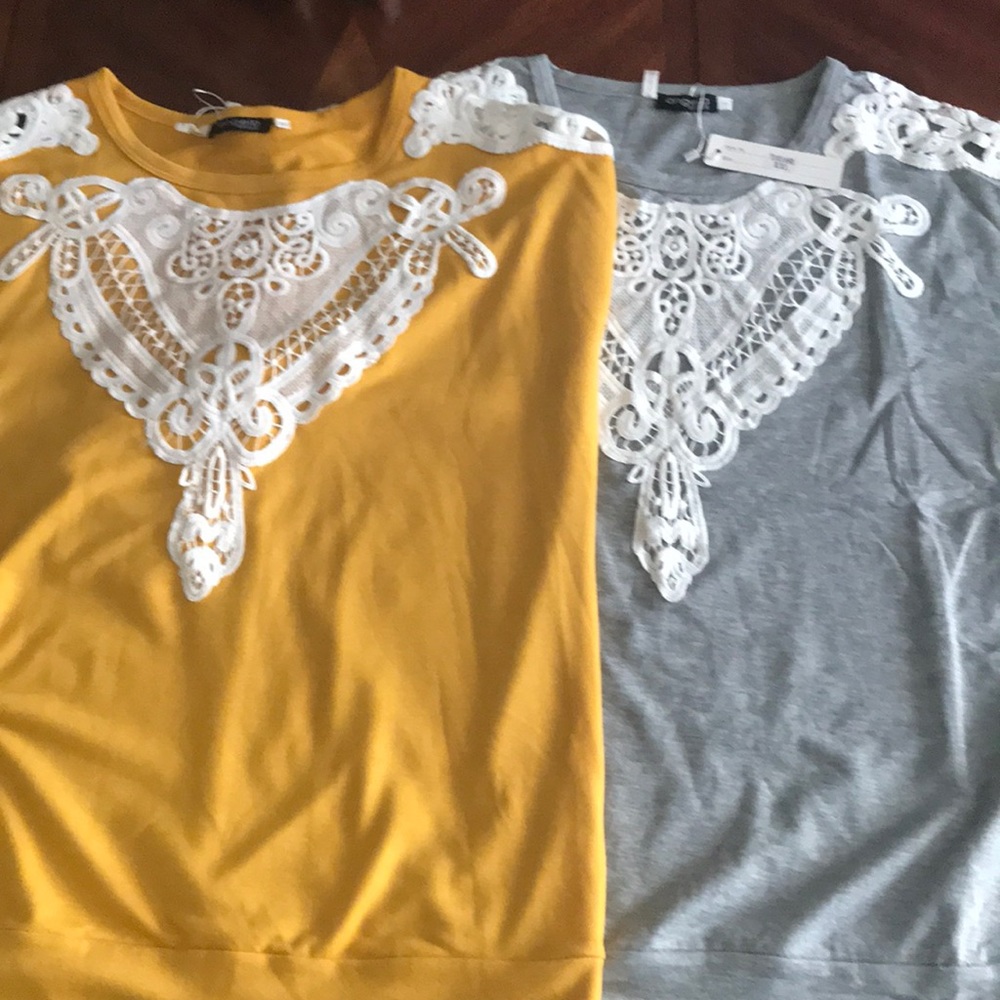 Appliqué and peek a boo cut out top